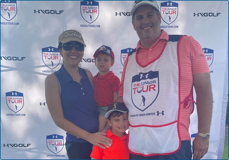 Carlos Carrero with wife and children.